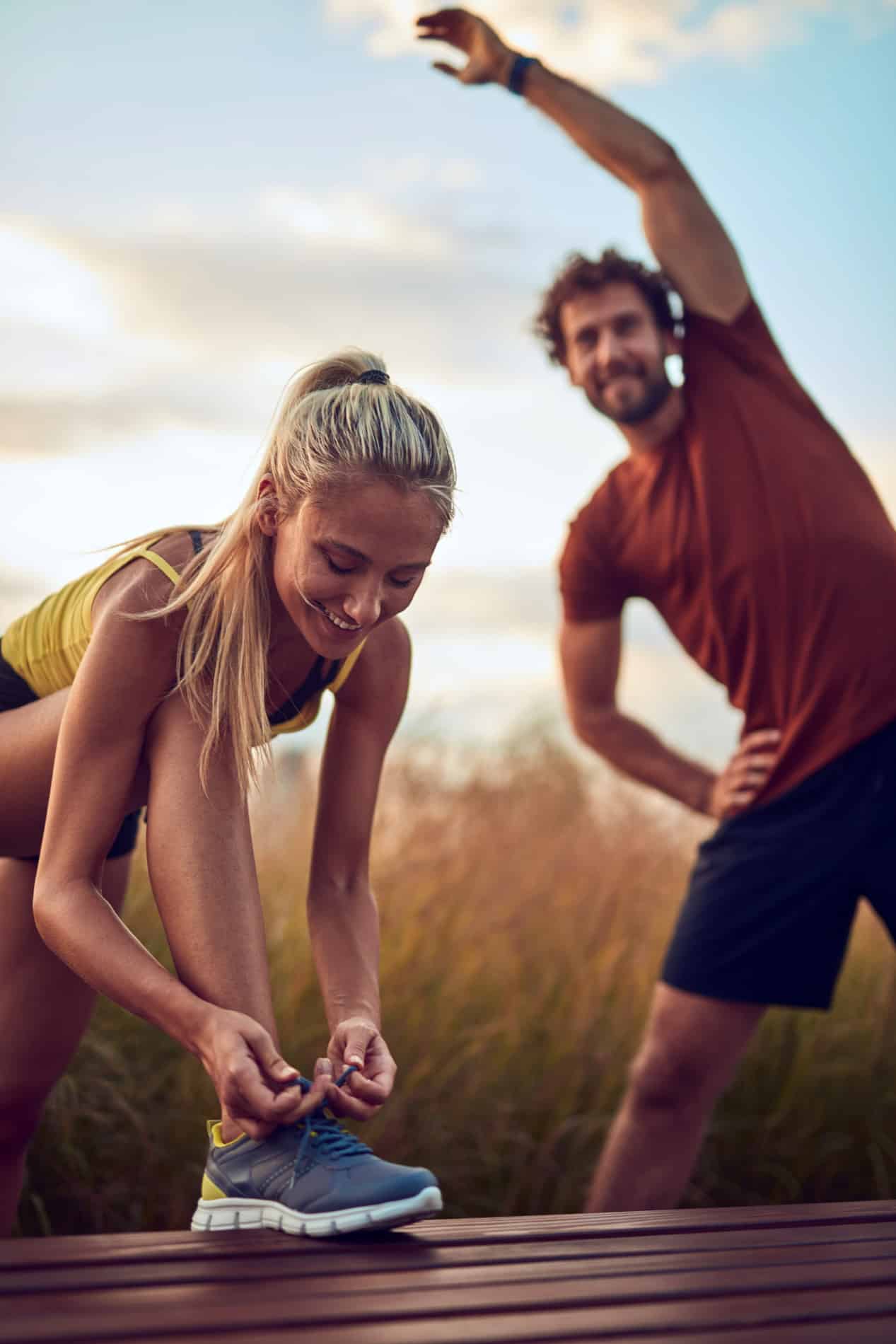 Man and woman running pain free from Hormone Replacement Therapy in Charlotte NC