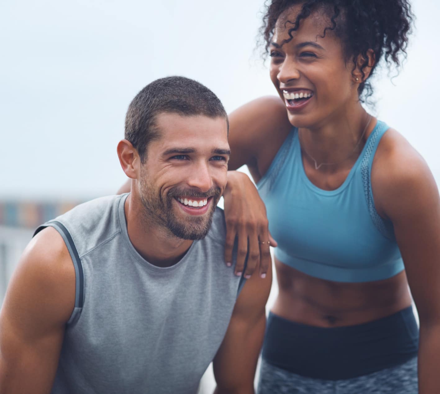 Couple laughing togther happy with their sexual wellness after care from a regenerative clinic in Charlotte