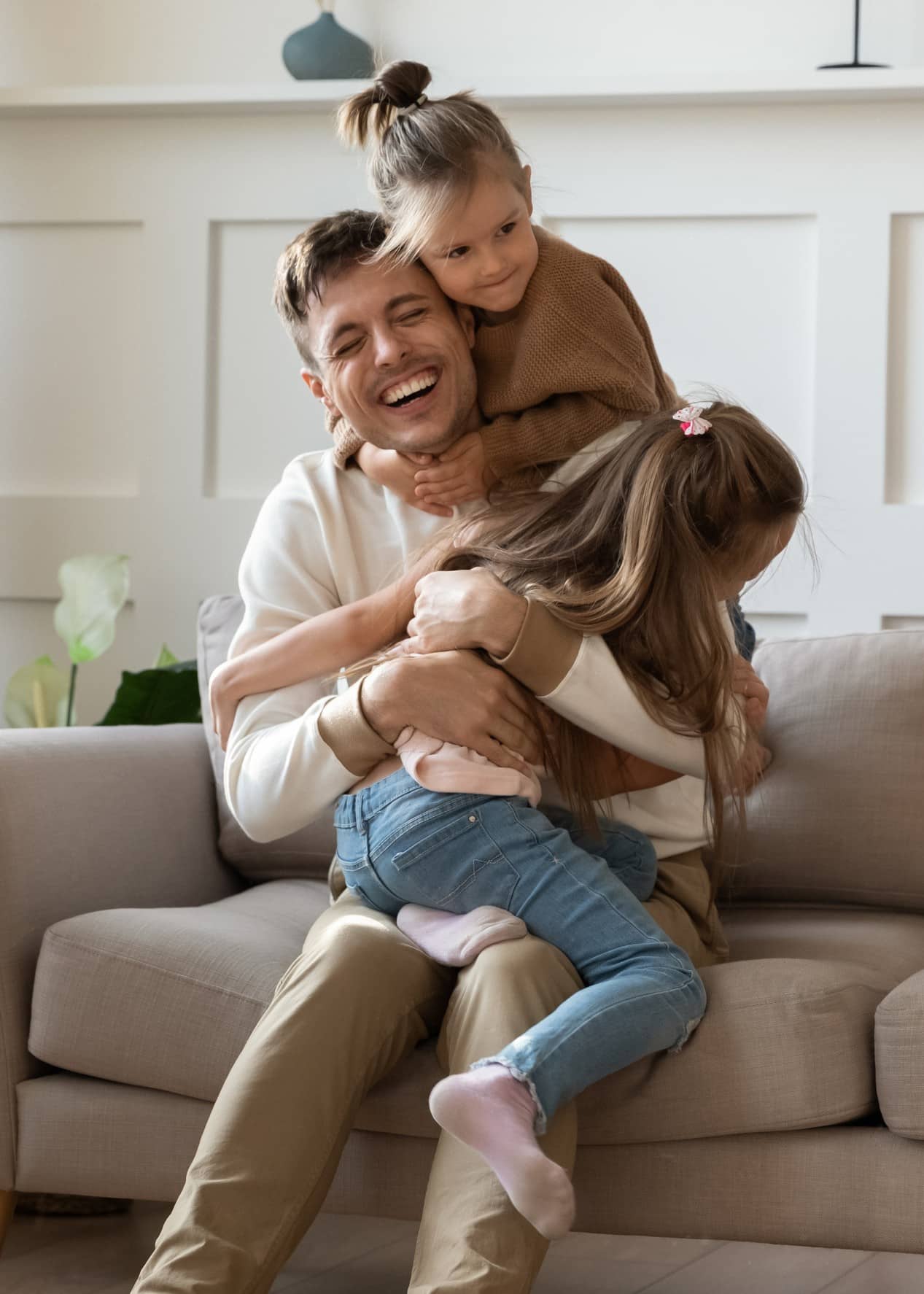 Man plays with his daughtera after symptom relief in Charlotte