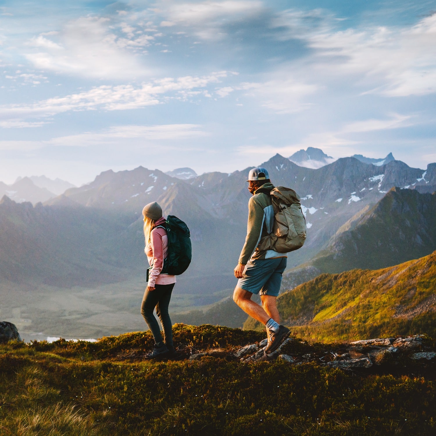 AdobeStock_1939362332 v2 Couple hikes on a mountain top after a successful Ultrasound Injection treatment in Charlotte NC