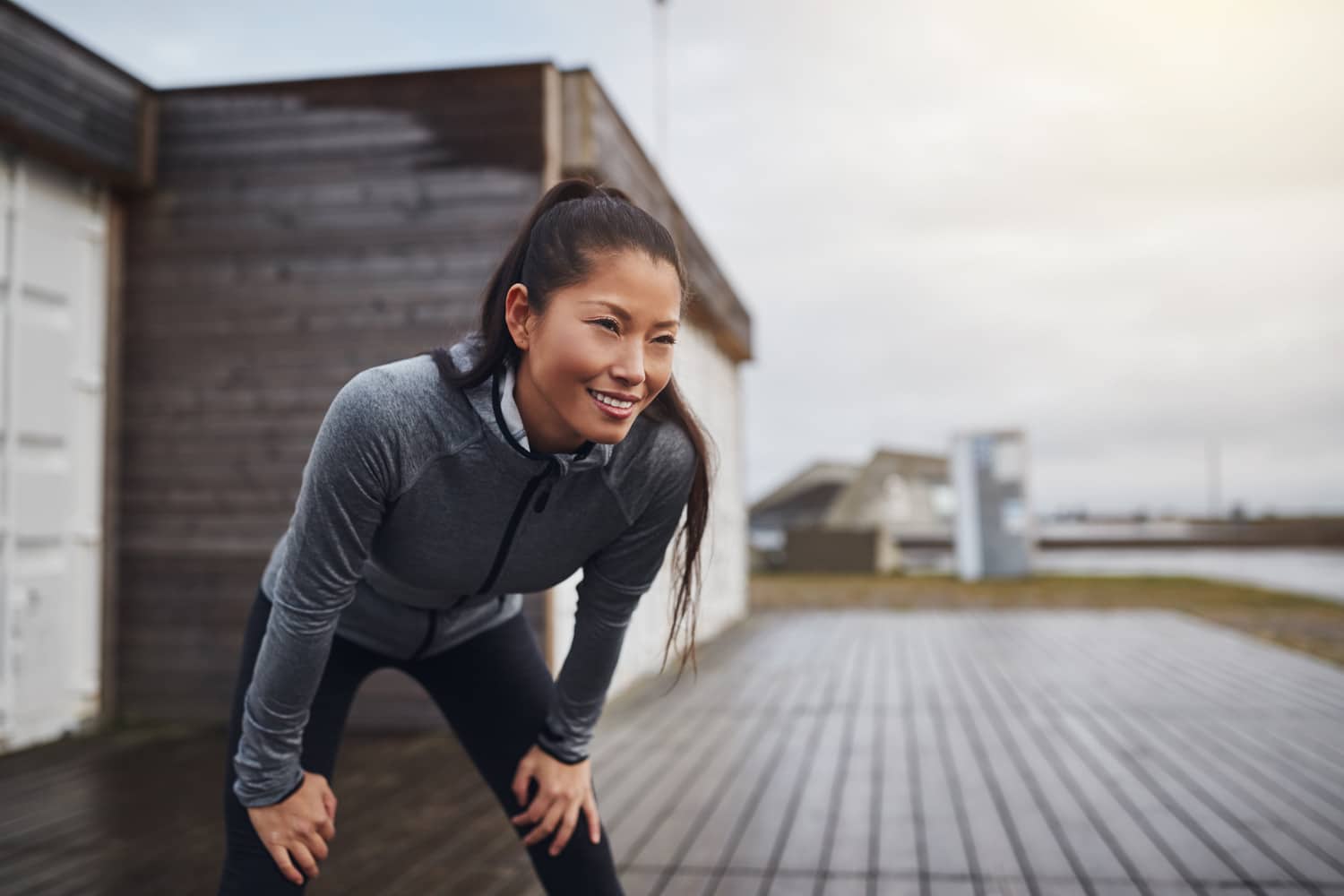 Woman runs outside managing her pain with the help of regenerative medicine in Charlotte NC